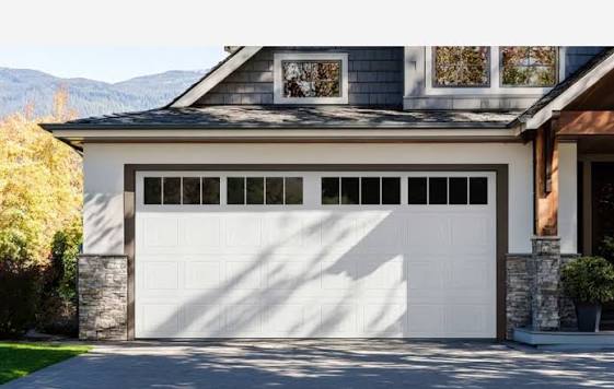 Deciding Whether To Repair Or Replace Your Garage Door